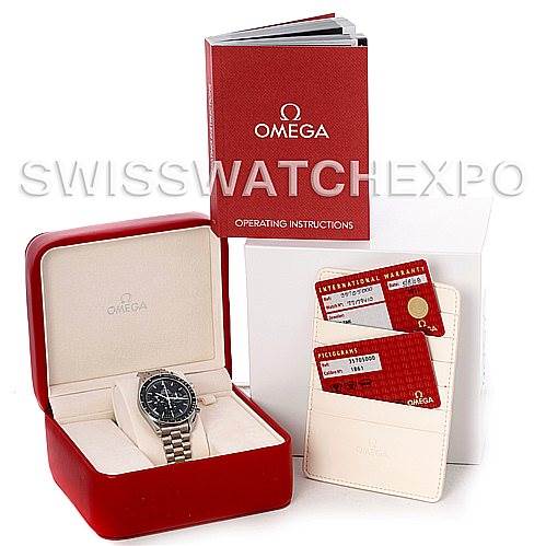The image shows an Omega Speedmaster 3570.50.00 Men
s Stainless Steel Black Dial 3570.50.00 Men
s Stainless Steel Black Dial watch in its box, accompanied by an operating instructions book and warranty cards.