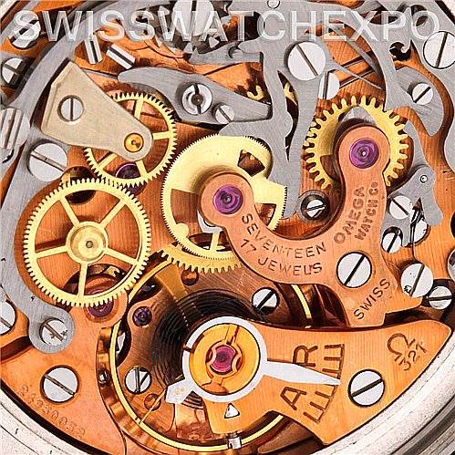 This image shows a close-up view of the intricate inner mechanisms of the Omega Speedmaster 145.012 Men's Stainless Steel Black Dial 145.012 Men's Stainless Steel Black Dial watch movement.