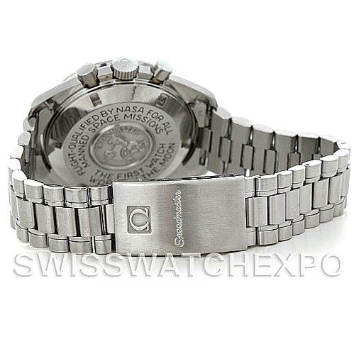 The image shows the back of an Omega Speedmaster Men
s Stainless Steel Black Dial Men
s Stainless Steel Black Dial watch, highlighting the clasp and engraved case back.