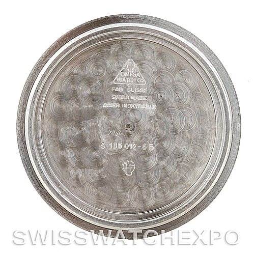 This image shows the inside case back of an Omega Speedmaster 105.012 Men's Stainless Steel Black Dial 105.012 Men's Stainless Steel Black Dial watch, displaying branding and model information.