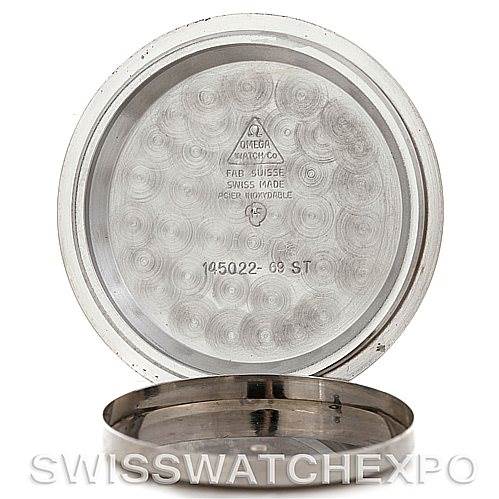 The image shows the opened case back of an Omega Speedmaster 145.022 Men's Stainless Steel Black Dial 145.022 Men's Stainless Steel Black Dial watch, displaying the inner markings and details.