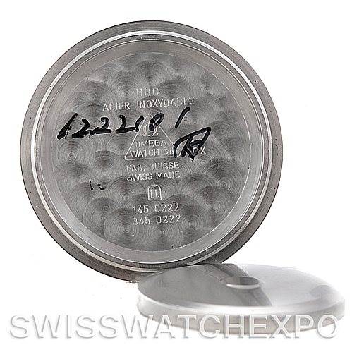 The image shows the inside case back of an Omega Speedmaster 3594.50.00 Men's Stainless Steel Black Dial 3594.50.00 Men's Stainless Steel Black Dial watch with the reference numbers and brand markings visible.