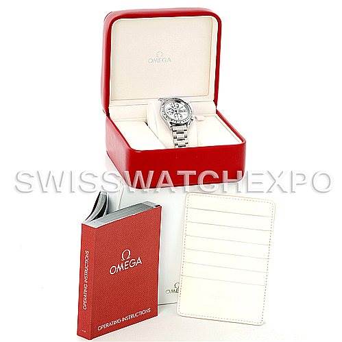The image shows an Omega Speedmaster 3513.30.00 Men
s Stainless Steel Silver Dial 3513.30.00 Men
s Stainless Steel Silver Dial watch in its box, along with an operating manual and paperwork.