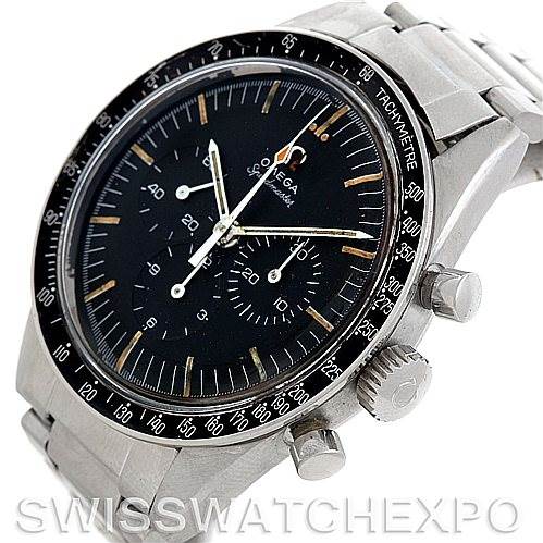 This is an angled view of an Omega Speedmaster 105.003-65 Men's Stainless Steel Black Dial 105.003-65 Men's Stainless Steel Black Dial watch showing the dial, bezel, subdials, pushers, and part of the bracelet.