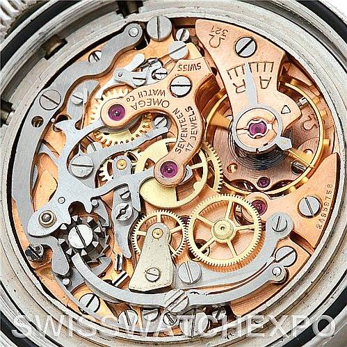 The image shows the intricate inner mechanics and movement of the Omega Speedmaster 105.003-65 Men's Stainless Steel Black Dial 105.003-65 Men's Stainless Steel Black Dial watch from a top-down angle.