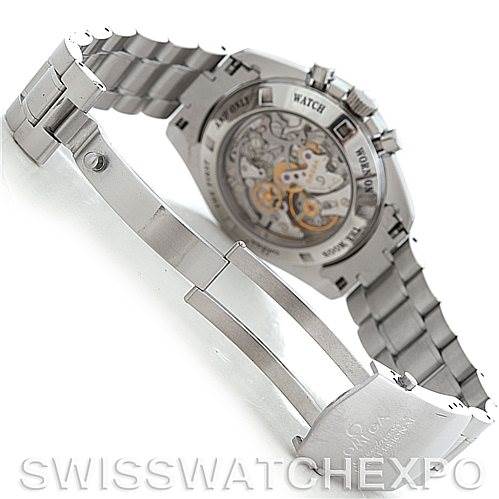 The image shows the back and clasp of an Omega Speedmaster 3576.50.00 Men's Stainless Steel Black Dial 3576.50.00 Men's Stainless Steel Black Dial watch on a reflective surface.