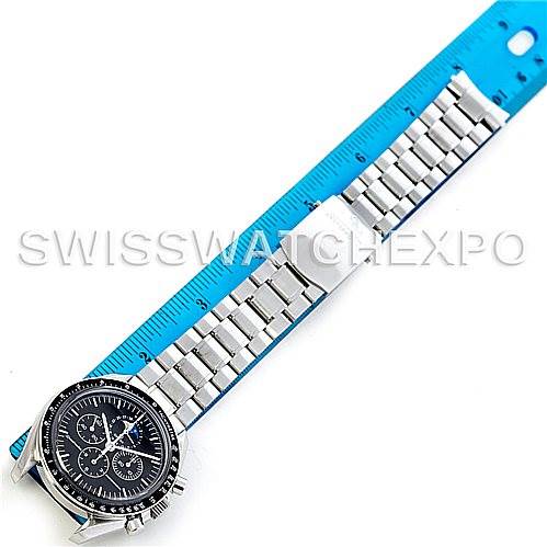 The image shows a top-down view of an Omega Speedmaster 3576.50.00 Men's Stainless Steel Black Dial 3576.50.00 Men's Stainless Steel Black Dial watch, displaying its dial and metal bracelet alongside a blue ruler.