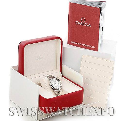 The image shows an Omega Speedmaster 3513.30.00 Men
s Stainless Steel Silver Dial 3513.30.00 Men
s Stainless Steel Silver Dial watch at an oblique angle, along with its red box, operating instructions, and cardholder.
