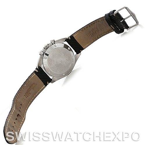 The image shows the back view of the Omega Speedmaster 145.012 Men
s Stainless Steel Black Dial 145.012 Men
s Stainless Steel Black Dial watch, highlighting the case back and leather strap with a clasp.