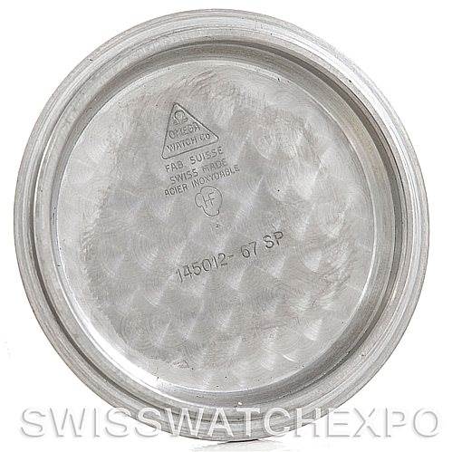 This image shows the inside case back of an Omega Speedmaster 145.012 Men
s Stainless Steel Black Dial 145.012 Men
s Stainless Steel Black Dial model, displaying various inscriptions and markings.