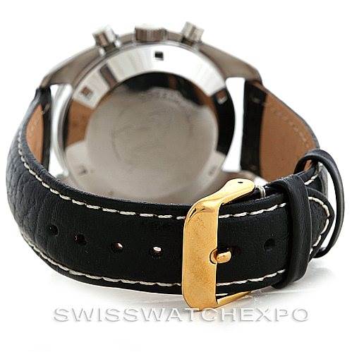 The image shows the back and side view of an Omega Speedmaster Men
s Stainless Steel Black Dial Men
s Stainless Steel Black Dial watch, highlighting its buckle and leather strap.