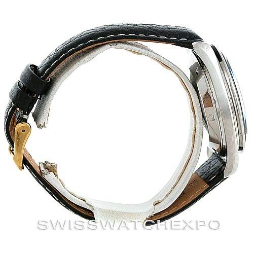 This image shows a side view of the Omega Speedmaster Men
s Stainless Steel Black Dial Men
s Stainless Steel Black Dial watch, featuring its case, bezel, and leather strap with a buckle.