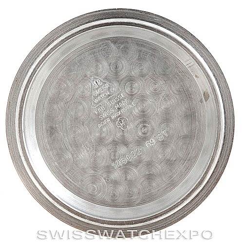 This image shows the interior view of the case back of an Omega Speedmaster Men
s Stainless Steel Black Dial Men
s Stainless Steel Black Dial watch.