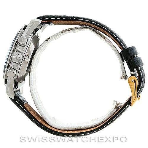 The image shows an Omega Speedmaster Men
s Stainless Steel Black Dial Men
s Stainless Steel Black Dial watch viewed from the side, highlighting the case, crown, pushers, and a leather strap with a buckle.