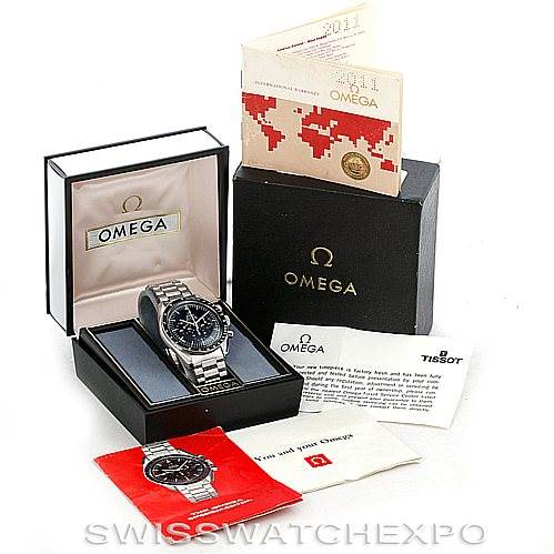 The image shows an Omega Speedmaster 145.022 Men
s Stainless Steel Black Dial 145.022 Men
s Stainless Steel Black Dial watch in its box, along with the outer box, manual, warranty cards, and product documentation.