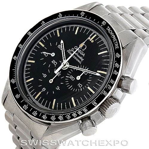 The image shows an Omega Speedmaster 145.022 Men
s Stainless Steel Black Dial 145.022 Men
s Stainless Steel Black Dial watch from an angled perspective, highlighting the face, bezel, crown, pushers, and bracelet.