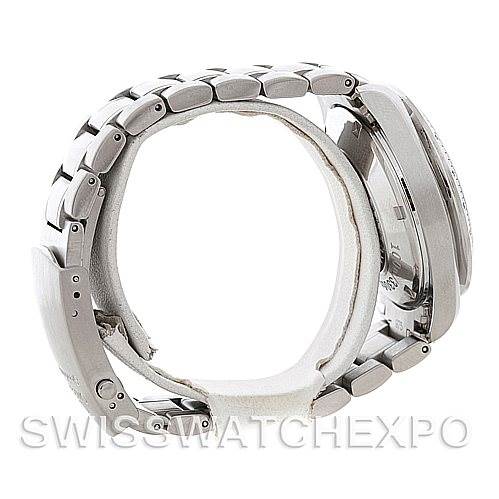 The image shows a side profile of the Omega Speedmaster 3211.30.00 Men
s Stainless Steel Silver Dial 3211.30.00 Men
s Stainless Steel Silver Dial, focusing on the metal bracelet and the watch case.