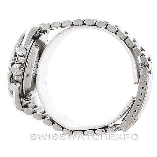 The image shows a side view of an Omega Speedmaster Men
s Stainless Steel Black Dial Men
s Stainless Steel Black Dial watch, highlighting the crown, pushers, and metal bracelet.