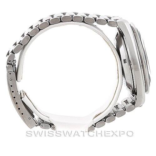 This side view of the Omega Speedmaster Men
s Stainless Steel Black Dial Men
s Stainless Steel Black Dial shows the watch
s case, bracelet, and clasp.