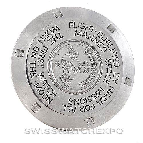 This image shows the case back of an Omega Speedmaster Men
s Stainless Steel Black Dial Men
s Stainless Steel Black Dial watch with engraved text and logo.