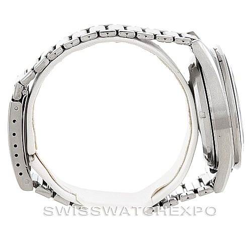 This image shows a side view of an Omega Speedmaster 105.003-65 Men
s Stainless Steel Black Dial 105.003-65 Men
s Stainless Steel Black Dial watch, highlighting the metal bracelet and case profile.