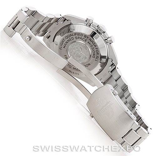 The image shows the back and clasp of an Omega Speedmaster 3577.50.00 Men
s Stainless Steel Black Dial 3577.50.00 Men
s Stainless Steel Black Dial watch from an angled overhead view.