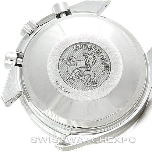 The image shows the back case of an Omega Speedmaster 3513.30.00 Men
s Stainless Steel Silver Dial 3513.30.00 Men
s Stainless Steel Silver Dial watch, featuring its engraved emblem and serial number.