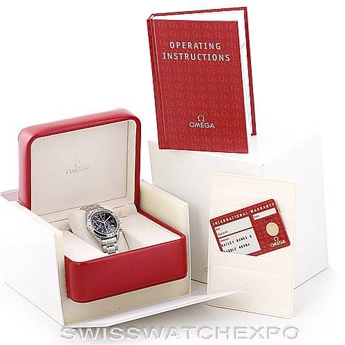 This image shows an Omega Speedmaster 3513.50.00 Men
s Stainless Steel Black Dial 3513.50.00 Men
s Stainless Steel Black Dial watch in its box along with an operating instructions booklet and an international warranty card.