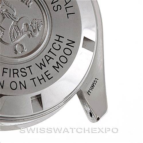 The image shows the back case and serial number of an Omega Speedmaster 3570.50.00 Men's Stainless Steel Black Dial 3570.50.00 Men's Stainless Steel Black Dial watch, with the engraving "FIRST WATCH ON THE MOON."