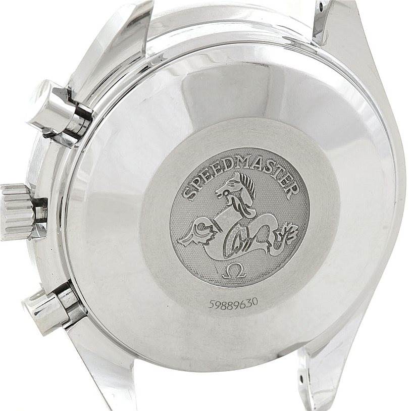 The image shows the back casing and side buttons of an Omega Speedmaster 3513.50.00 Men
s Stainless Steel Black Dial 3513.50.00 Men
s Stainless Steel Black Dial watch, featuring its engraved emblem and serial number.