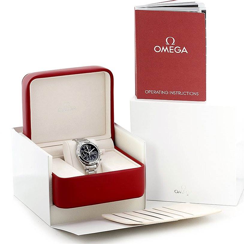 The image shows an Omega Speedmaster 3513.50.00 Men
s Stainless Steel Black Dial 3513.50.00 Men
s Stainless Steel Black Dial watch in a red display box with its operating instructions booklet and white packaging.