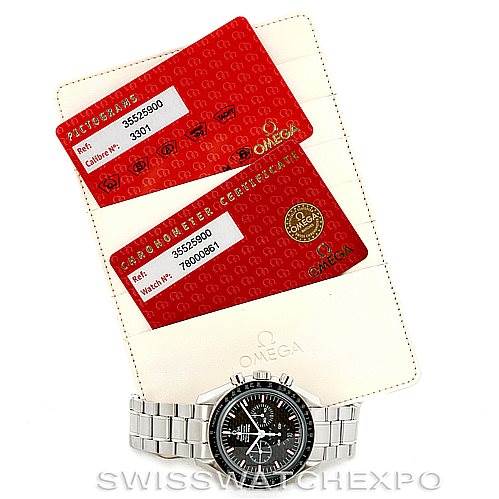 The image shows an Omega Speedmaster 3552.59.00 Men
s Stainless Steel Black Dial 3552.59.00 Men
s Stainless Steel Black Dial watch and two red Omega certification cards, all placed on a white background with "SWISSWATCHEXPO" text.