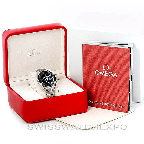 The image shows the Omega Speedmaster Men
s Stainless Steel Black Dial Men
s Stainless Steel Black Dial watch in a red Omega box, accompanied by operating instructions manual.