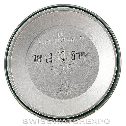 This image shows the inside case back of an Omega Speedmaster 3220.50.00 Men
s Stainless Steel Black Dial 3220.50.00 Men
s Stainless Steel Black Dial watch, displaying model markings and inscriptions.