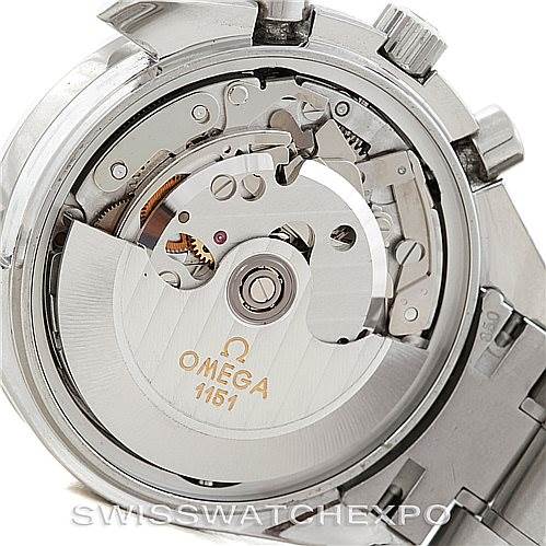 The image shows the open case back of an Omega Speedmaster 3220.50.00 Men
s Stainless Steel Black Dial 3220.50.00 Men
s Stainless Steel Black Dial watch, revealing the rotor and inner mechanics.