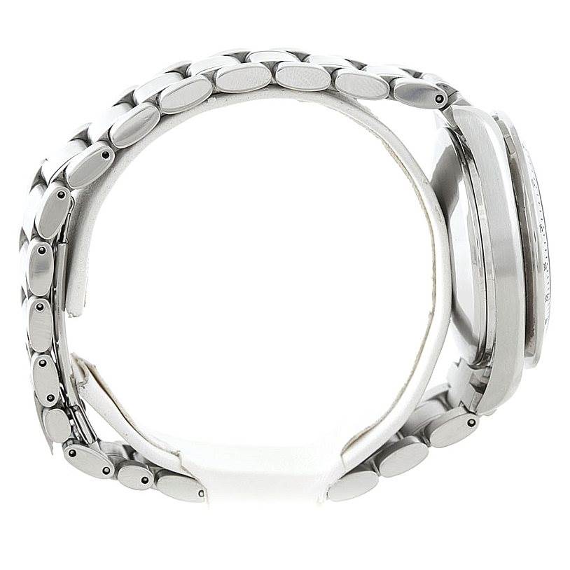 The image shows a side view of the Omega Speedmaster 3513.50.00 Men
s Stainless Steel Black Dial 3513.50.00 Men
s Stainless Steel Black Dial watch, highlighting its band links and case.