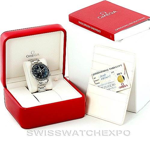 The image shows the Omega Speedmaster 3572.50.00 Men
s Stainless Steel Black Dial 3572.50.00 Men
s Stainless Steel Black Dial watch, displayed in a red Omega box, accompanied by a warranty card and instruction manual.