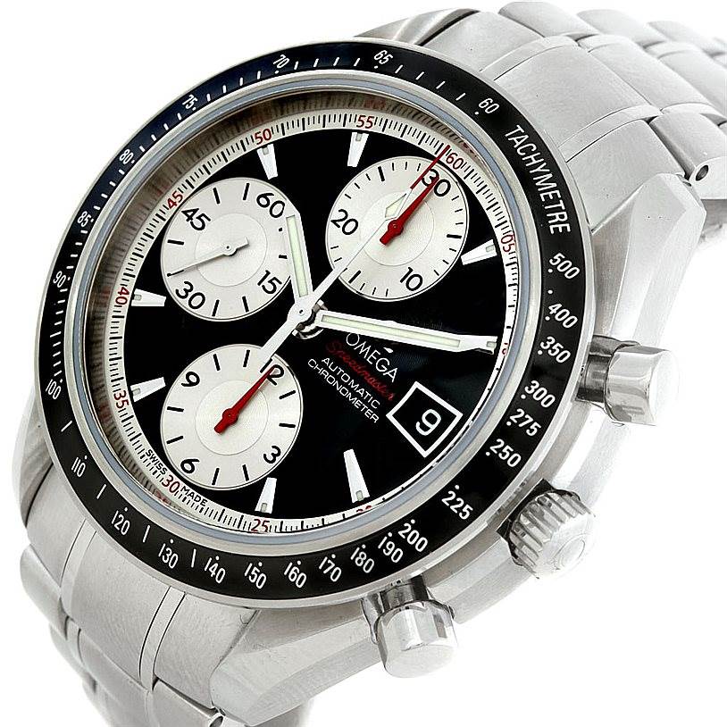 The Omega Speedmaster 3210.51.00 Men's Stainless Steel Black Dial 3210.51.00 Men's Stainless Steel Black Dial watch is shown at a tilted angle, highlighting its dial, tachymeter, chronograph subdials, and date window.