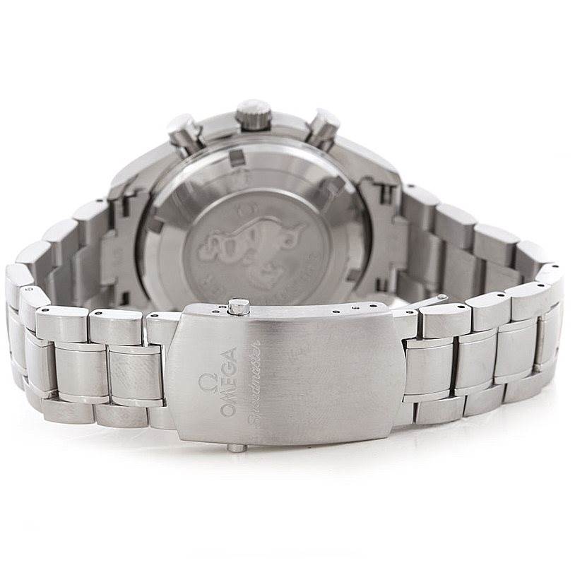The image shows the back and clasp of an Omega Speedmaster 3210.51.00 Men's Stainless Steel Black Dial 3210.51.00 Men's Stainless Steel Black Dial watch, highlighting the bracelet and the engraved case back.