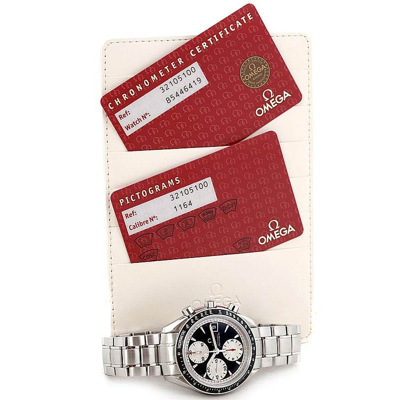 The image shows a stainless steel Omega Speedmaster 3210.51.00 Men's Stainless Steel Black Dial 3210.51.00 Men's Stainless Steel Black Dial watch with its bracelet, placed below its chronometer certificate and pictogram cards.