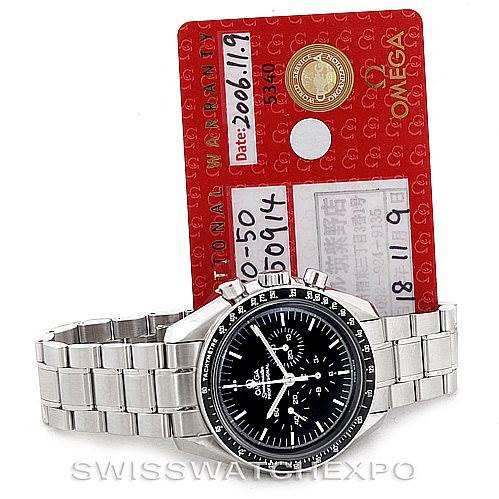 This image shows an Omega Speedmaster 3570.50.00 Men
s Stainless Steel Black Dial 3570.50.00 Men
s Stainless Steel Black Dial watch angled to the front, with its warranty card placed behind it.