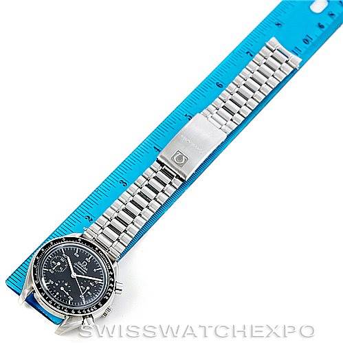 The image shows an Omega Speedmaster 3510.50.00 Men
s Stainless Steel Black Dial 3510.50.00 Men
s Stainless Steel Black Dial watch laid flat next to a blue ruler, displaying the face and full metal bracelet.