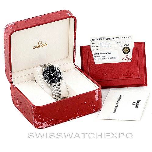 The Omega Speedmaster 3510.50.00 Men
s Stainless Steel Black Dial 3510.50.00 Men
s Stainless Steel Black Dial watch and warranty card are shown at an angle, along with the red Omega case and documentation.
