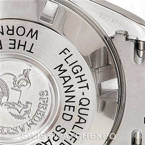 The image shows the back case of the Omega Speedmaster 3570.50.00 Men
s Stainless Steel Black Dial 3570.50.00 Men
s Stainless Steel Black Dial watch, highlighting the engravings and details on the case back.