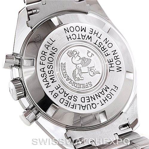 The image shows the back case of an Omega Speedmaster 3570.50.00 Men
s Stainless Steel Black Dial 3570.50.00 Men
s Stainless Steel Black Dial watch, highlighting its engravings and metal bracelet.