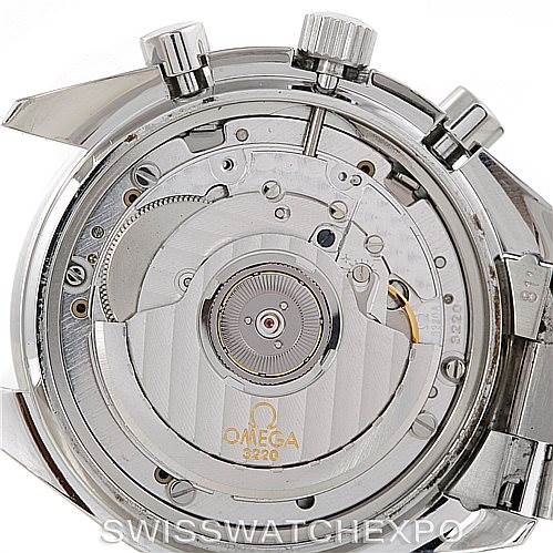 The image shows the back view of the Omega Speedmaster 3510.50.00 Men
s Stainless Steel Black Dial 3510.50.00 Men
s Stainless Steel Black Dial watch, highlighting its exposed movement and internal mechanism.