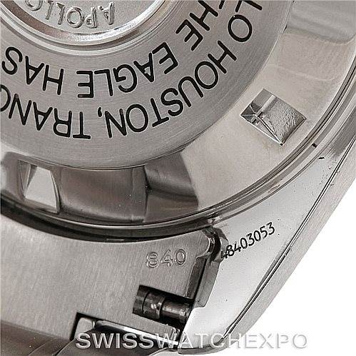 This image shows a close-up of the case back and part of the bracelet of an Omega Speedmaster 3560.50.00 Men
s Stainless Steel Black Dial 3560.50.00 Men
s Stainless Steel Black Dial watch.