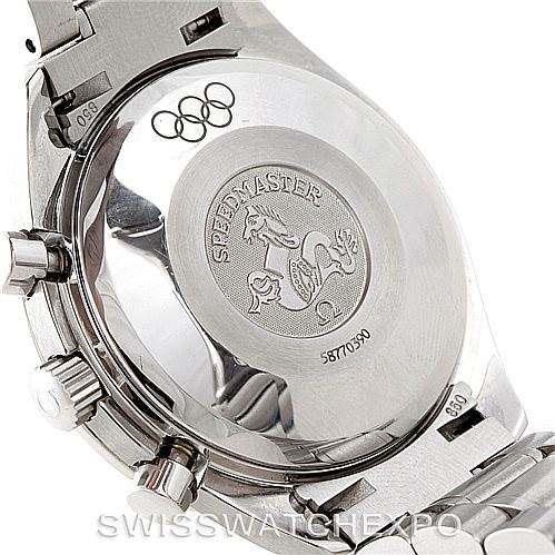 The image shows the back case of an Omega Speedmaster 3515.20.00 Men
s Stainless Steel White Dial 3515.20.00 Men
s Stainless Steel White Dial watch, highlighting its engraved logo and serial number.