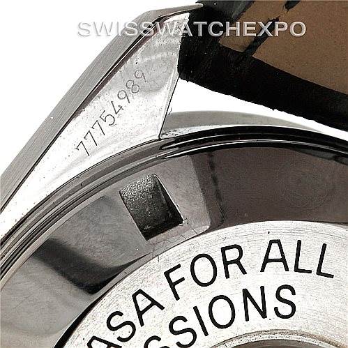 The image shows the lug, case back, and strap of an Omega Speedmaster 3870.50.31 Men
s Stainless Steel Black Dial 3870.50.31 Men
s Stainless Steel Black Dial, revealing part of the serial number and engraved text.