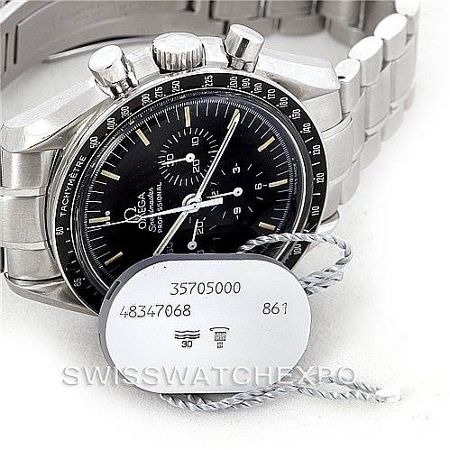 The image shows an Omega Speedmaster 3570.50.00 Men's Stainless Steel Black Dial 3570.50.00 Men's Stainless Steel Black Dial watch at an angle highlighting its face, bezel, and bracelet with tags attached.